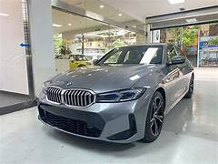Dịch vụ thay Kính chắn gió xe BMW 318i tận nơi
