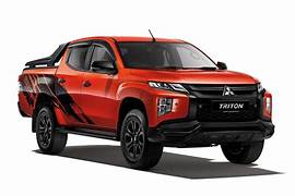 Thay kính xe Mitsubishi Triton